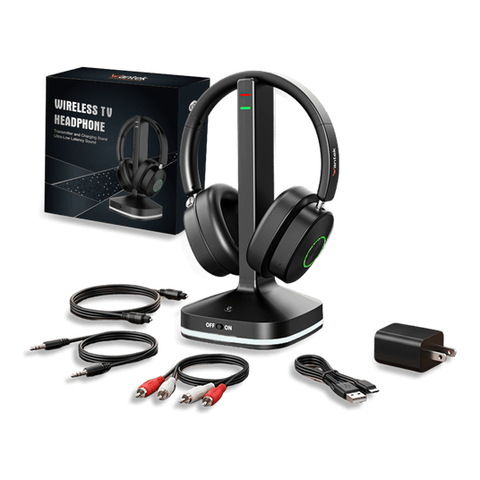 Black wireless TV headphones with a matching charging dock, shown with the retail box, audio cables, power adapter, and USB cable on a white background.