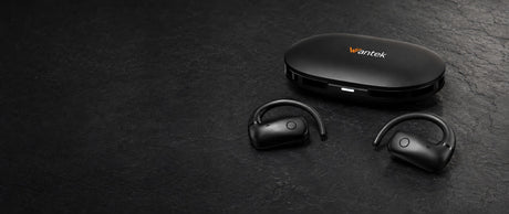 Black Wantek open-ear earbuds beside their charging case on a dark tabletop