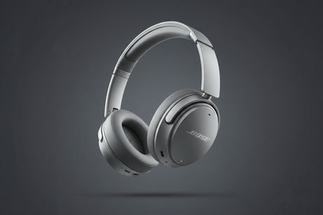 Silver Bose Noise Cancelling Headphones 700 on a dark background