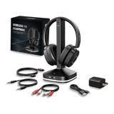 Black wireless TV headphones with a matching charging dock, shown with the retail box, audio cables, power adapter, and USB cable on a white background.