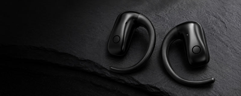 Wantek OBT030 open-ear clip-on earbuds in black with a lightweight open-ear design